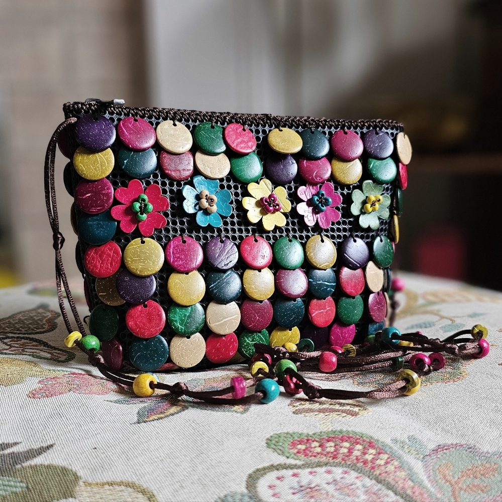 Coconut shell disc bag. Made in Thailand.